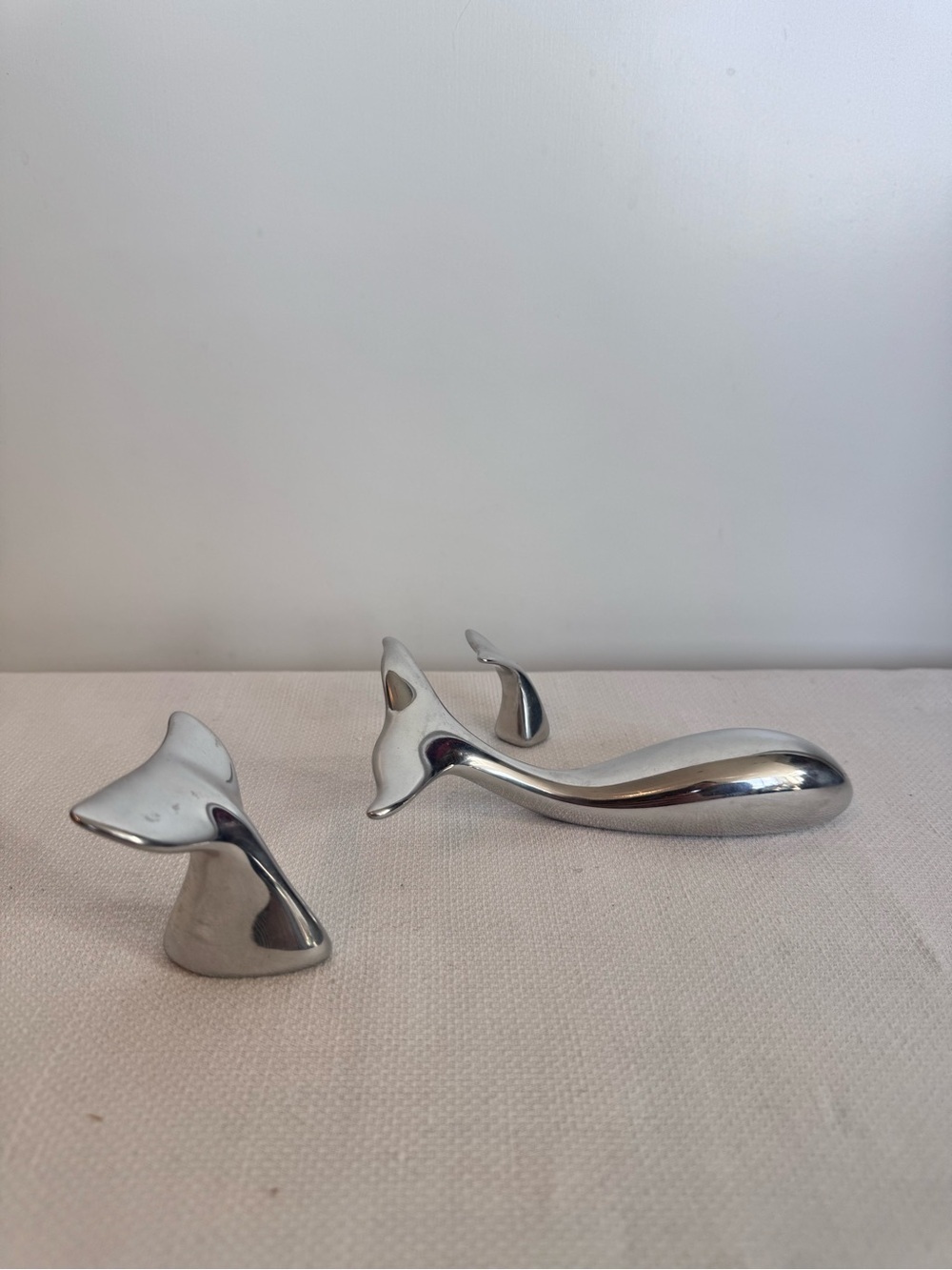 Set of Hoselton Aluminum Signed Whale Tails